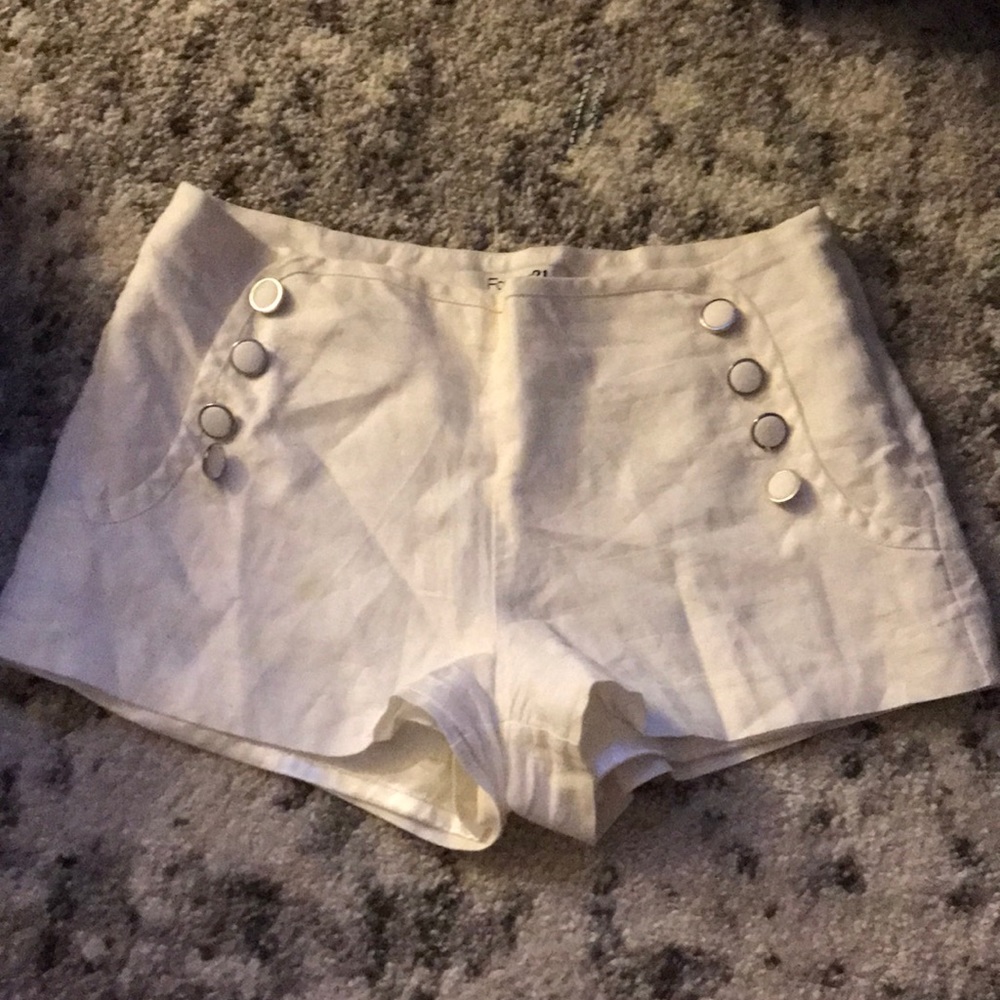 White buttoned shorts